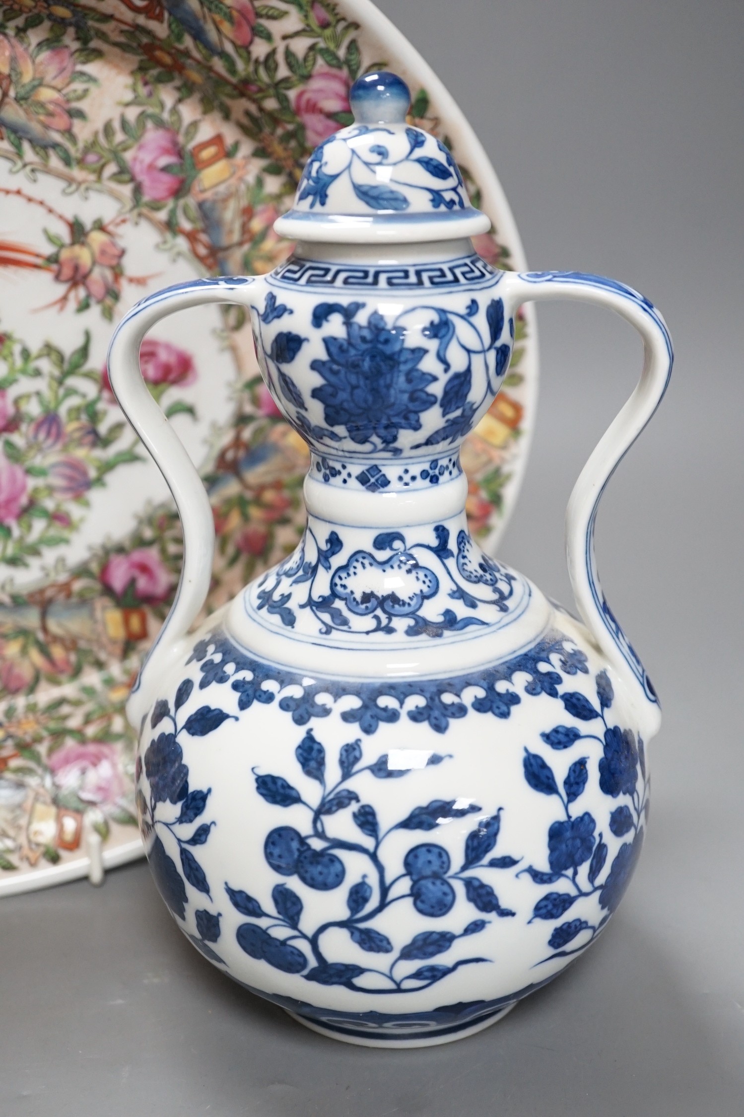 A Chinese blue and white jar, cover and a famille rose dish, dish length 35cm